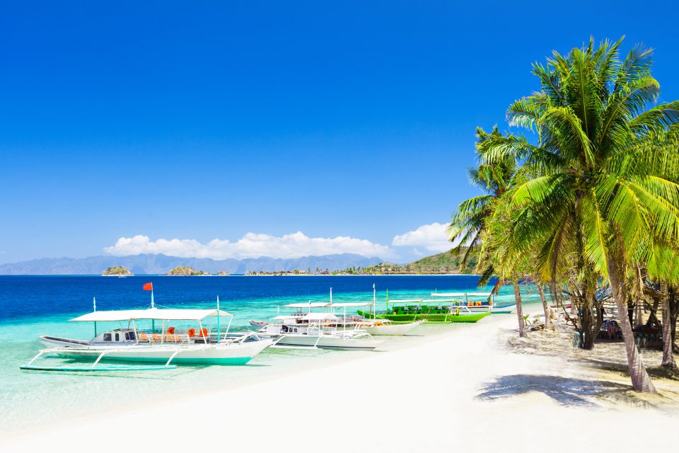 Boats moored on the beach