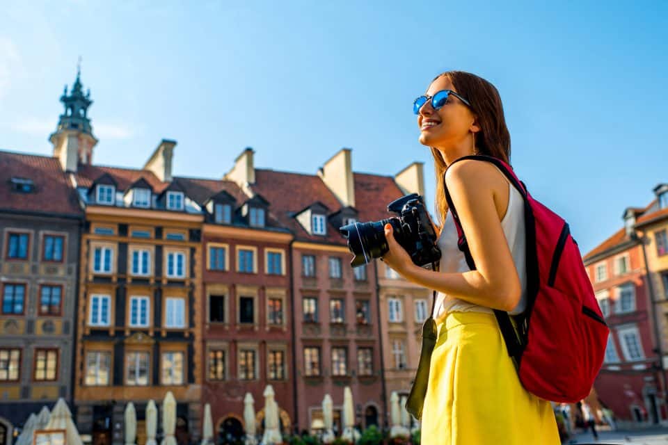 A woman taking photos in Europe