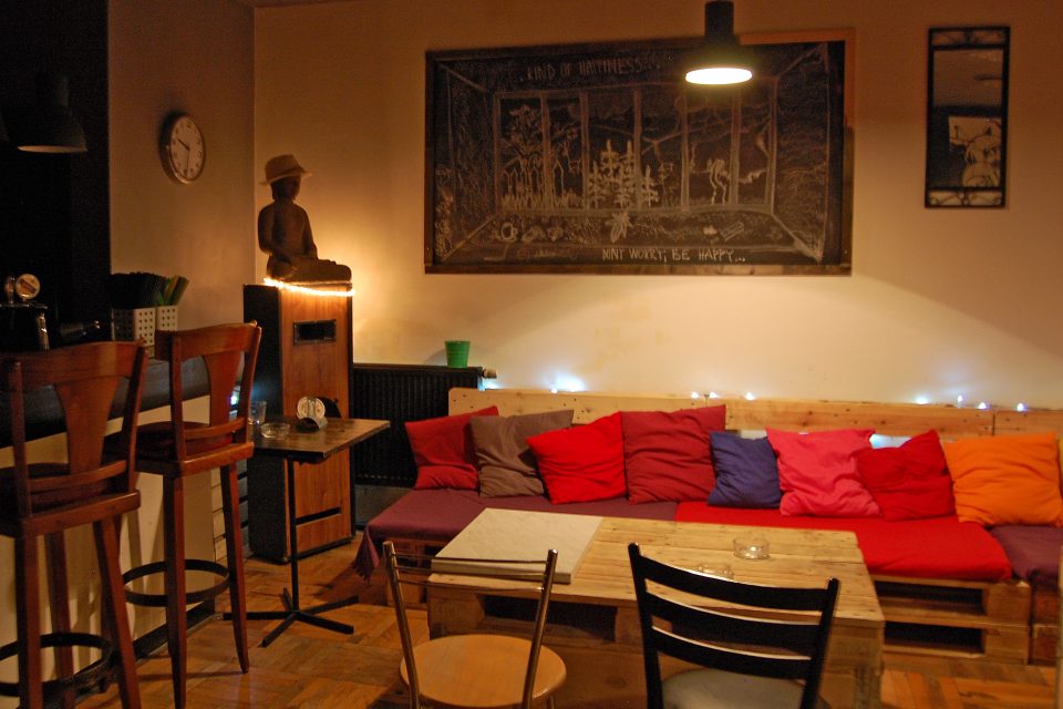 Low lighting hostel common room