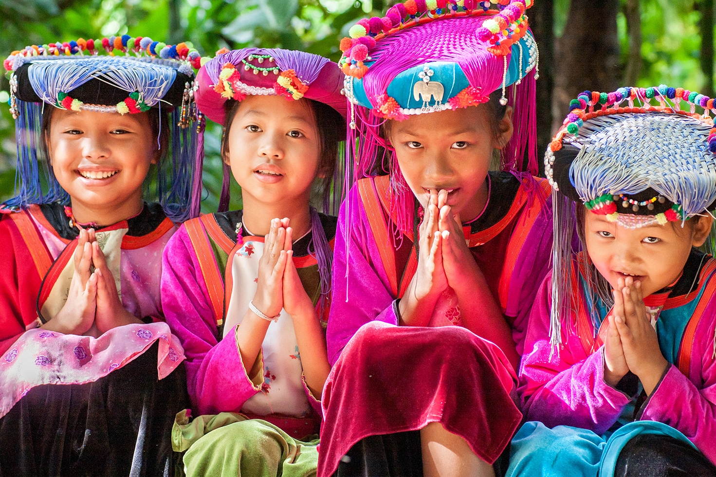 Four girls in traditional thai dress
