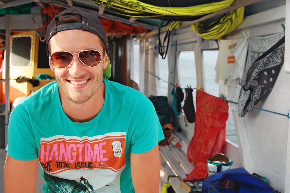 A man sitting inside a boat