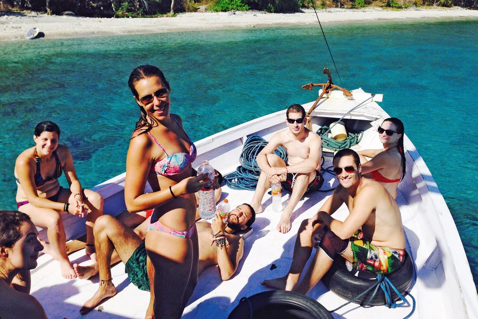 A group of people on a boat in the sea