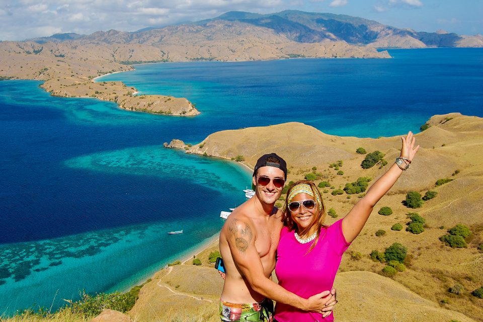 A couple with views of islands below them