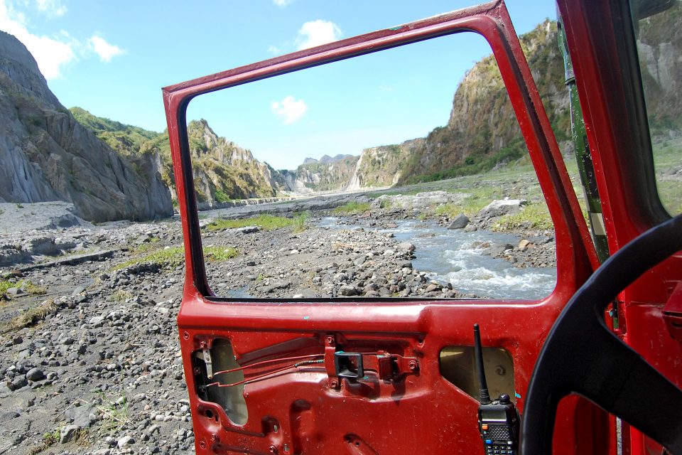 A view of the mountains through a car window