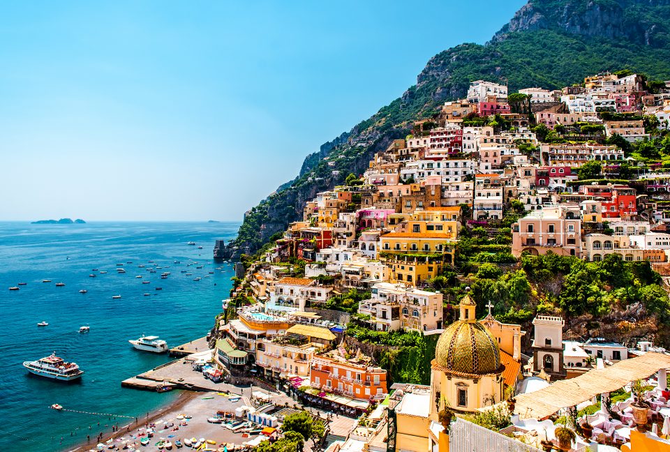 Colourful houses on the side of a mountain