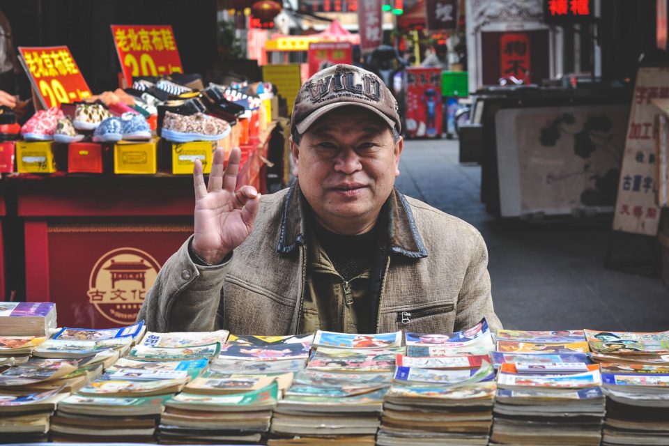 A local man sitting at a book stall
