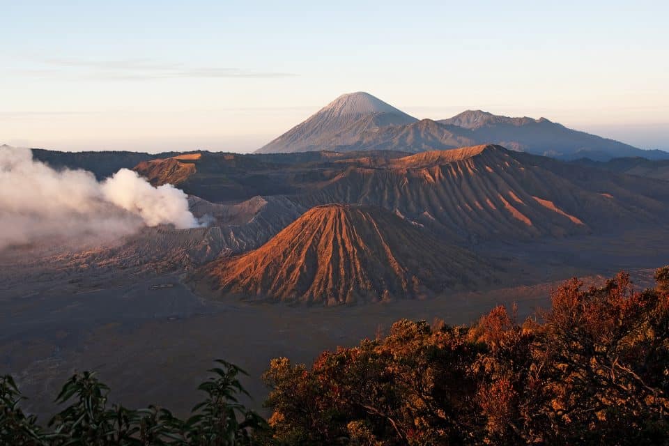 A volcano with smoke coming out