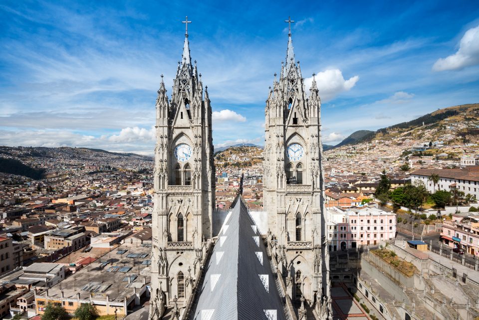 Top of a church with the city below