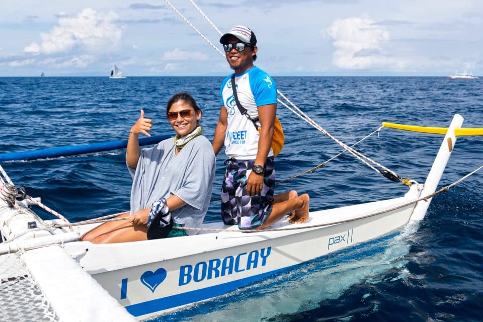 Sitting at the helm of a paraw