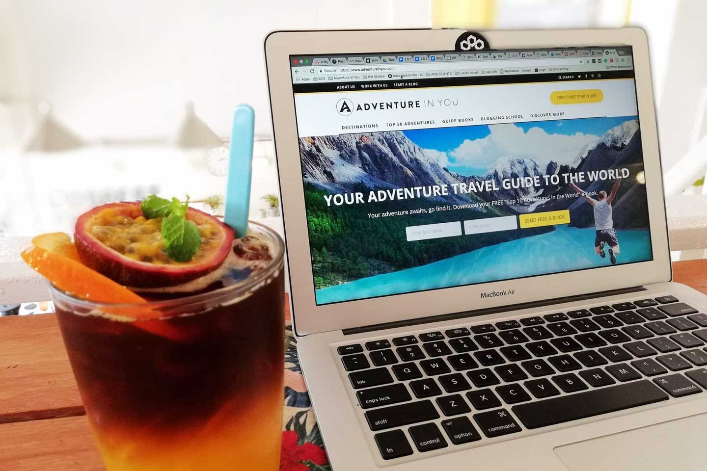 Adventure in You website on laptop screen