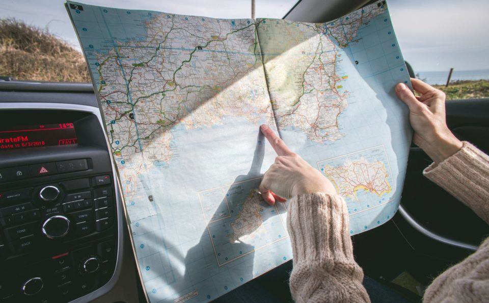 road trip looking at map