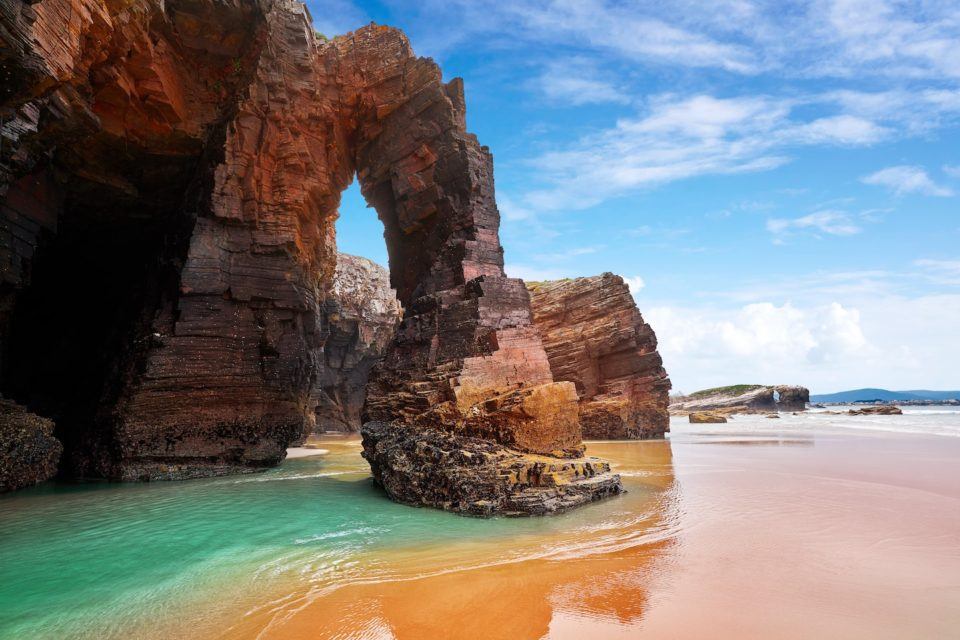 beach with huge rock formations