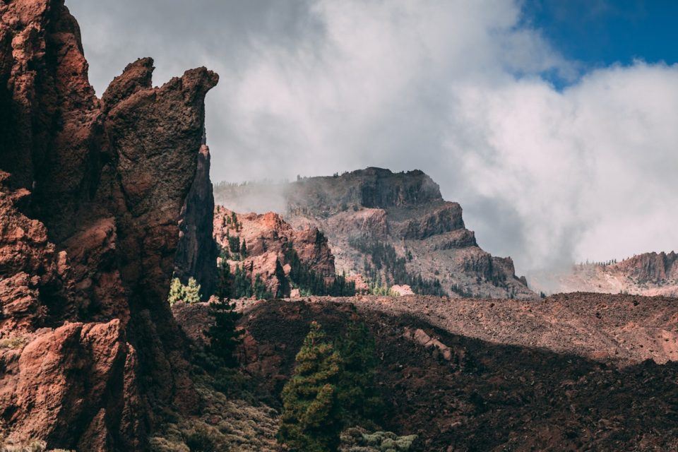 volcanic landscape and clouds in national park spain