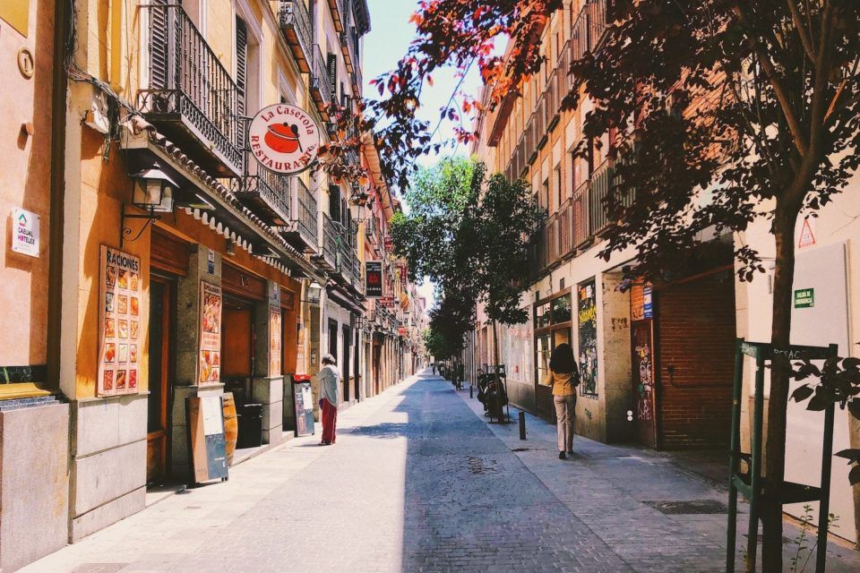 colorful street, half in shadow half in sunlight