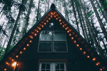 a-frame cabin in the woods with lights - coolest airbnb in the us