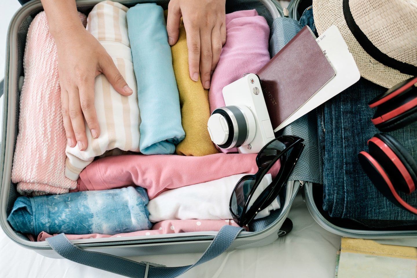 woman packing a suitcase for a tripp