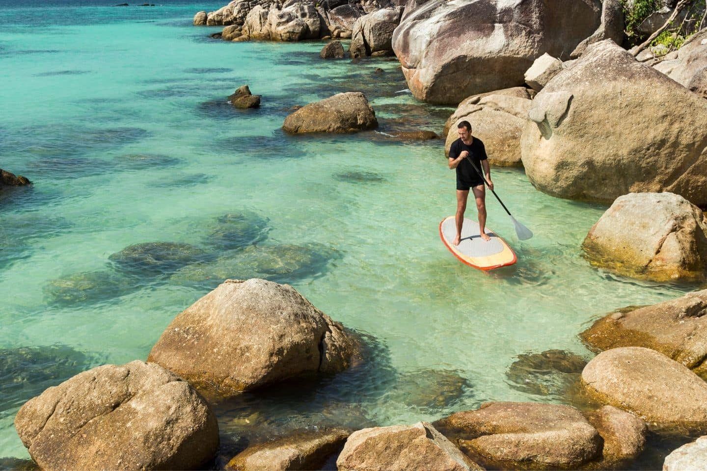 Man practice paddle surf