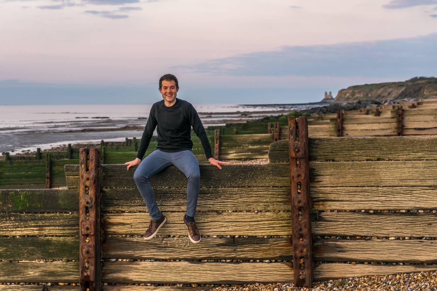 Author wearing Unbound Merino Raglan Crew Sweatshirt in black